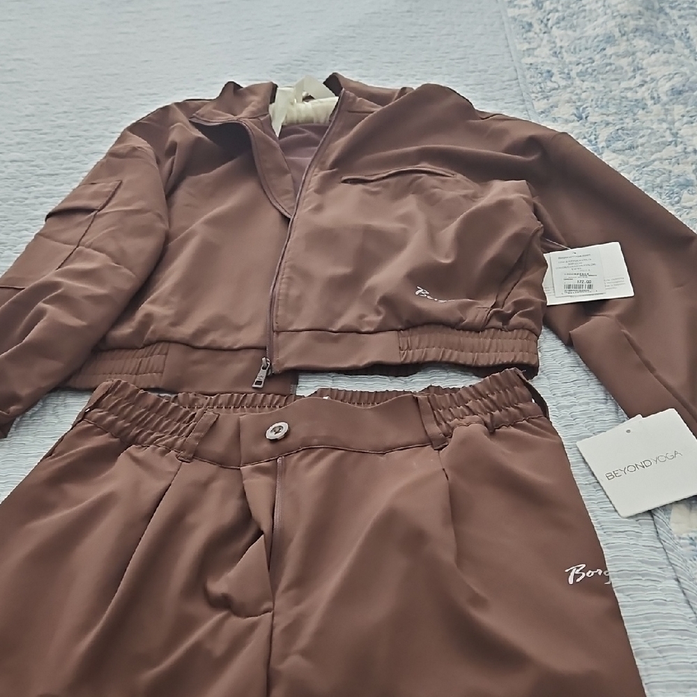 Beyond Yoga Chocolate Brown Jacket and Pants Set.it Has Borgata Logo On It.